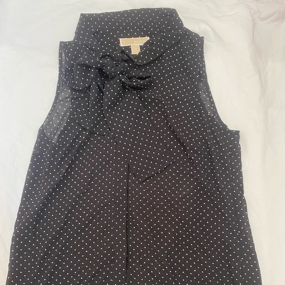 Black and white polka dot button down top with bow